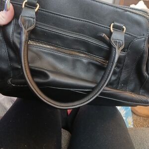 Black Leather Handbag with Gold Accents